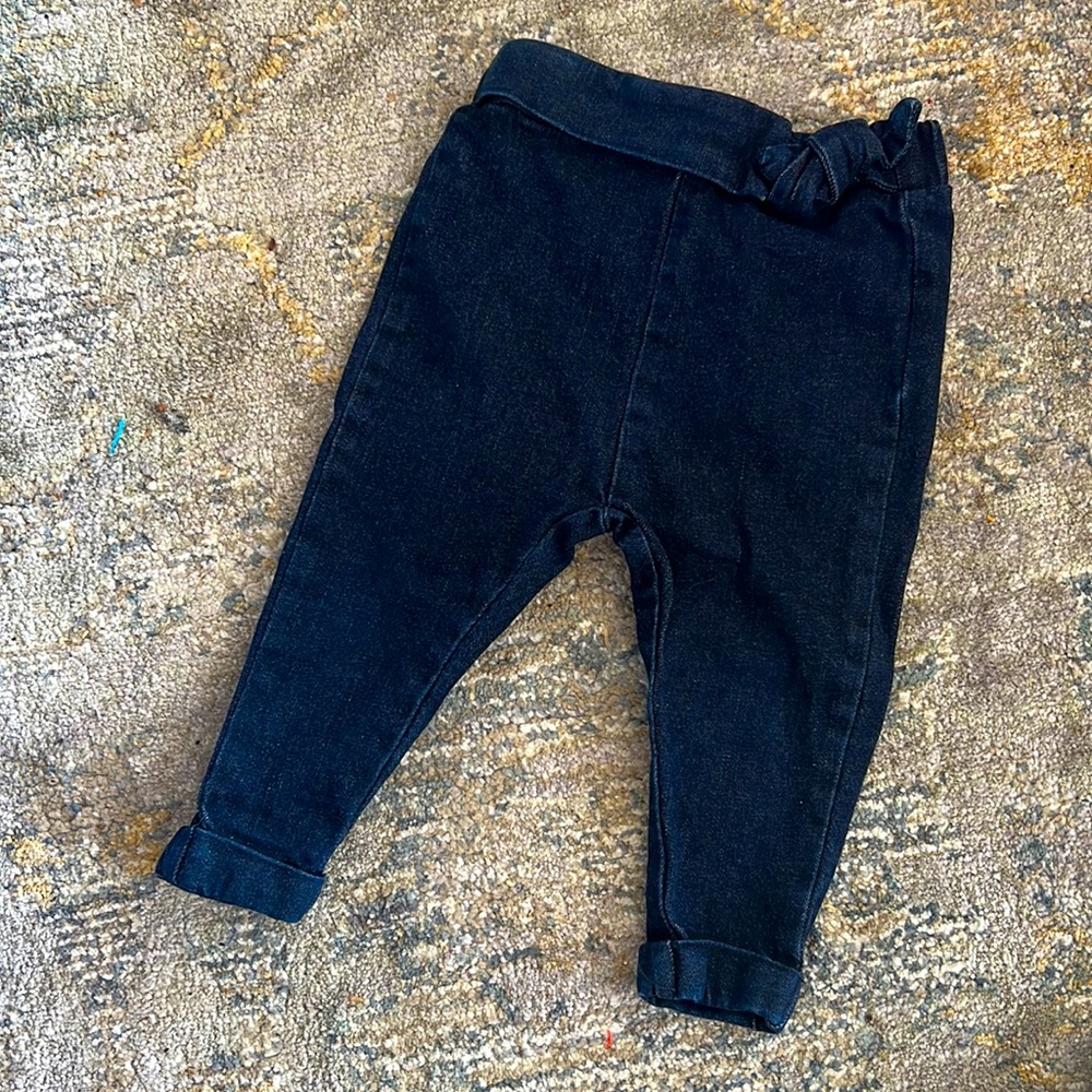 Slightly worn blue jeans could start wearing before 18M depending on height etc.
